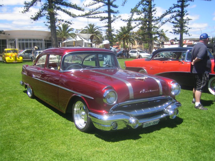 1955 Pontiac sedan in candy apple red - 02.jpg